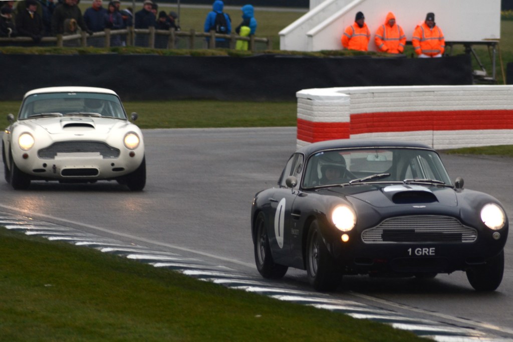 Aston Martin DB4GTs out in the weather